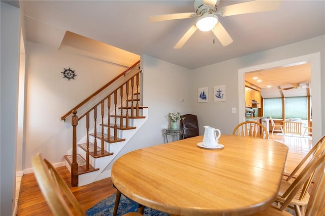 130 Knowlesway Ext, Narragansett, RI 02882 - dining area with wood finished floors, ceiling fan, and stairs