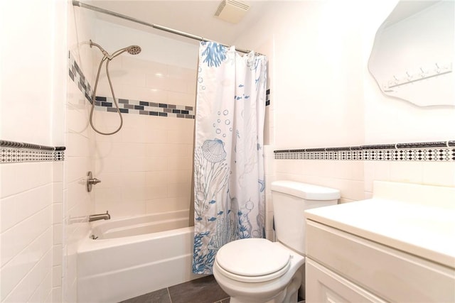 130 Knowlesway Ext, Narragansett, RI 02882 - full bathroom with tile walls, shower / bath combo, vanity, tile patterned floors, and a wainscoted wall