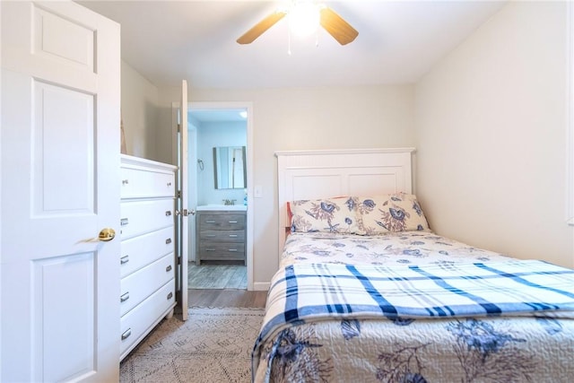 130 Knowlesway Ext, Narragansett, RI 02882 - bedroom with light wood-type flooring, connected bathroom, and a ceiling fan