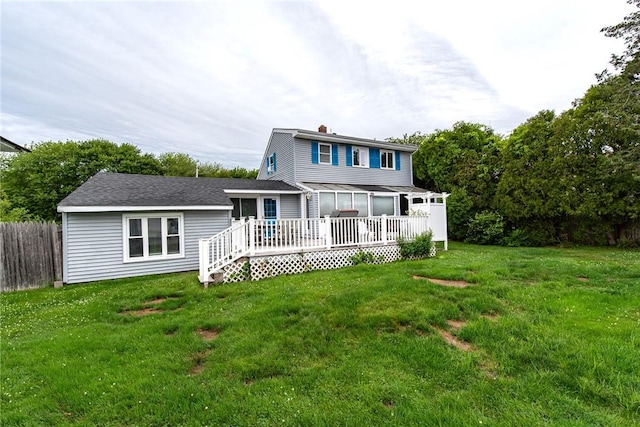 130 Knowlesway Ext, Narragansett, RI 02882 - back of house with a deck and a chimney