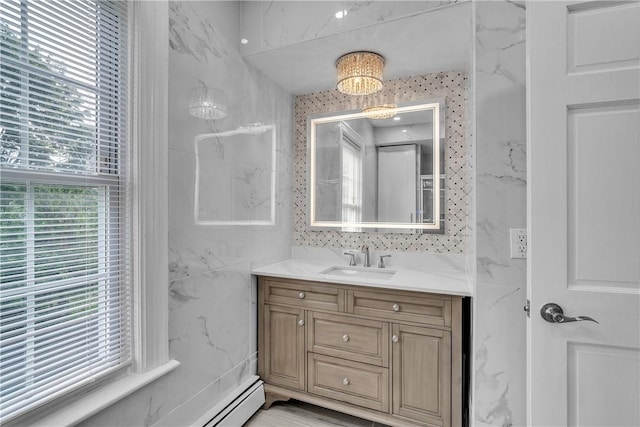 199 Linwood Ave, Providence, RI 02907 - bathroom with vanity, tile walls, and a baseboard heating unit