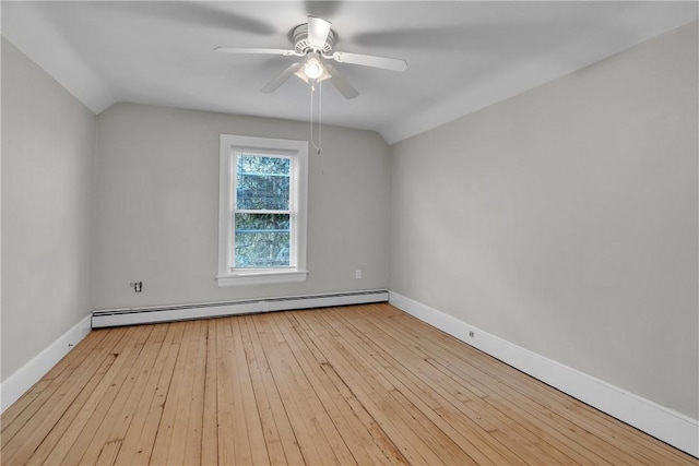 199 Linwood Ave, Providence, RI 02907 - empty room with a baseboard heating unit, vaulted ceiling, ceiling fan, and hardwood / wood-style flooring