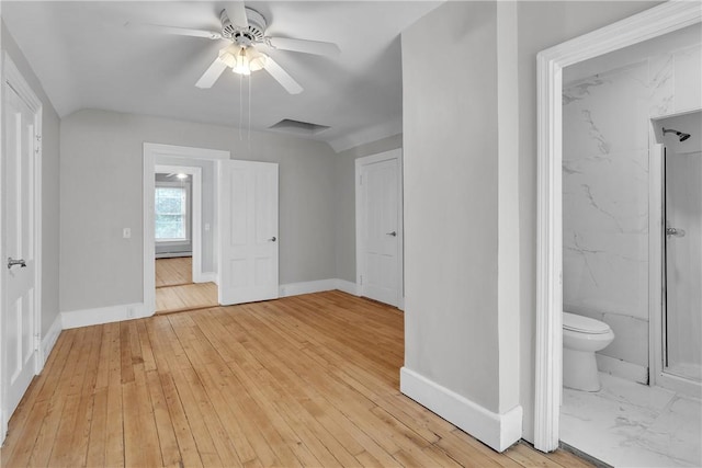 199 Linwood Ave, Providence, RI 02907 - unfurnished bedroom with light wood-style floors, ensuite bathroom, and ceiling fan
