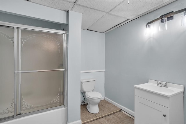 199 Linwood Ave, Providence, RI 02907 - bathroom featuring vanity, tile patterned floors, bath / shower combo with glass door, and a paneled ceiling