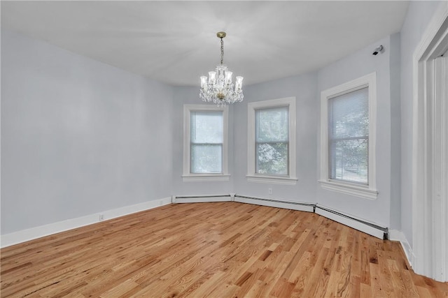 199 Linwood Ave, Providence, RI 02907 - unfurnished room with light wood-style floors, plenty of natural light, and a chandelier