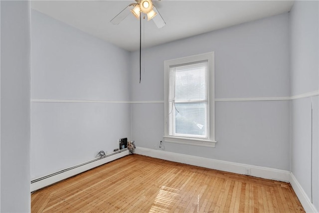 199 Linwood Ave, Providence, RI 02907 - spare room with a baseboard radiator, hardwood / wood-style floors, and a ceiling fan