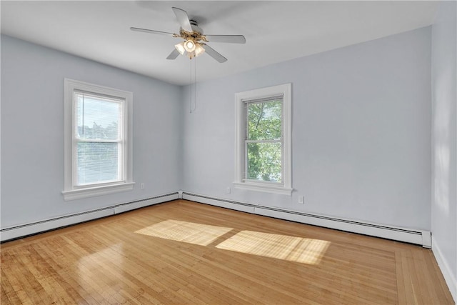 199 Linwood Ave, Providence, RI 02907 - unfurnished room featuring a baseboard heating unit, ceiling fan, and wood finished floors