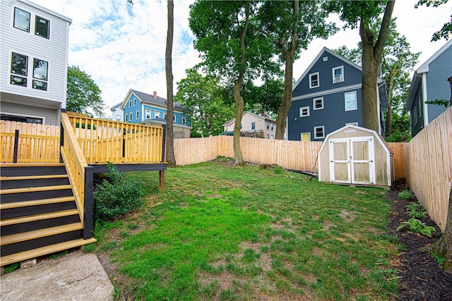 9 Locust St, Providence, RI 02906 - fenced backyard featuring a storage unit and a deck