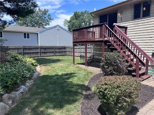 27 Brook St, West Warwick, RI 02893 - fenced backyard featuring stairs and a deck
