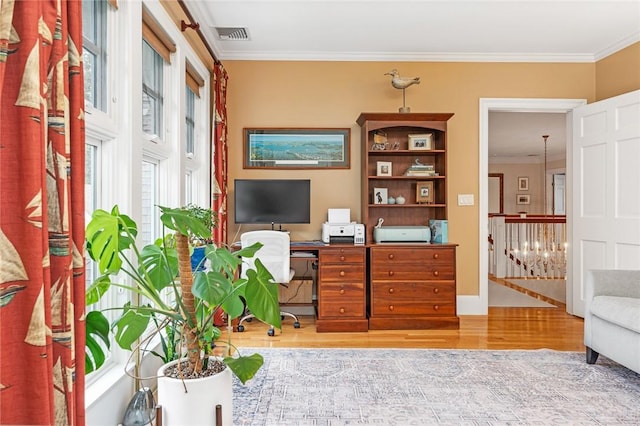 15 Courageous Cir, Bristol, RI 02809 - sitting room with wood finished floors, a desk, ornamental molding, and an upstairs landing