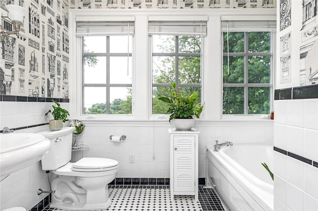 15 Courageous Cir, Bristol, RI 02809 - bathroom with a garden tub, tile walls, and wallpapered walls