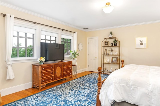 15 Courageous Cir, Bristol, RI 02809 - bedroom with ornamental molding, multiple windows, and wood finished floors