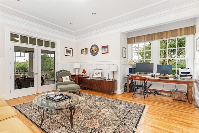 15 Courageous Cir, Bristol, RI 02809 - living room with a desk, french doors, wood finished floors, a decorative wall, and ornamental molding