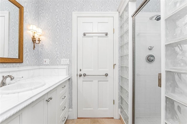 15 Courageous Cir, Bristol, RI 02809 - full bath with wallpapered walls, vanity, a shower stall, and tile patterned flooring