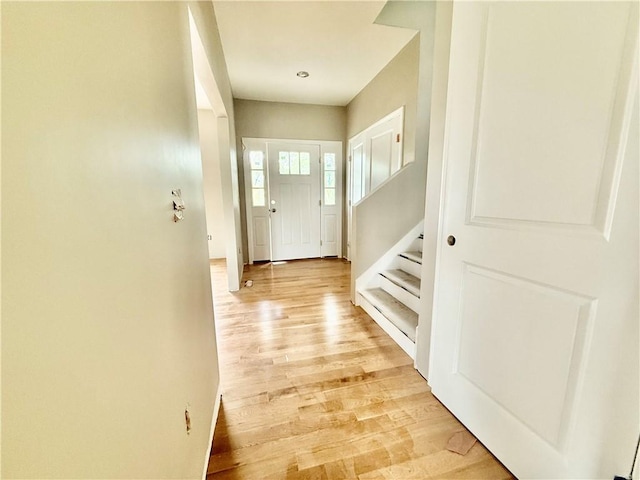 94 Ashaway Rd, Westerly, RI 02891 - doorway to outside featuring light wood-style flooring and stairway