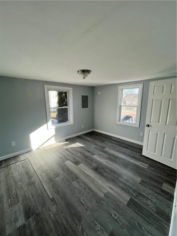 22 Agnes St, West Warwick, RI 02893 - unfurnished room featuring electric panel and dark wood-style floors