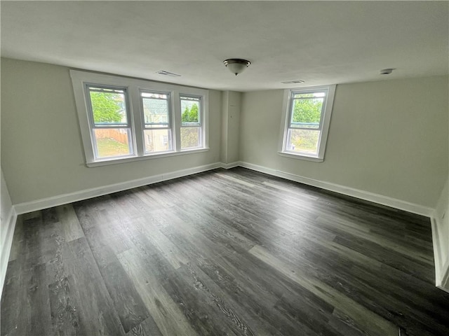 22 Agnes St, West Warwick, RI 02893 - empty room with dark wood finished floors