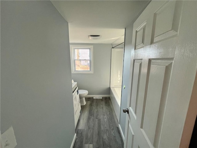 22 Agnes St, West Warwick, RI 02893 - full bathroom with wood finished floors, vanity, and shower / bathtub combination