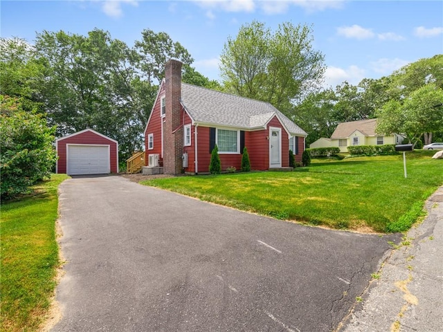 10 Palmer St, Smithfield, RI 02828 - view of front of property featuring an outdoor structure, a detached garage, driveway, a chimney, and a front yard