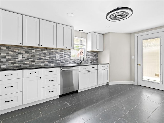 10 Palmer St, Smithfield, RI 02828 - kitchen with dishwasher, dark countertops, decorative backsplash, white cabinetry, and pendant lighting