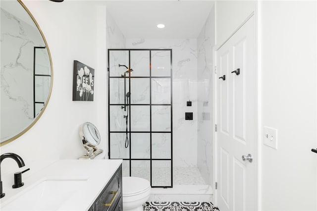 1000 Providence Pl Unit 467, Providence, RI 02903 - bathroom featuring vanity, a marble finish shower, and recessed lighting