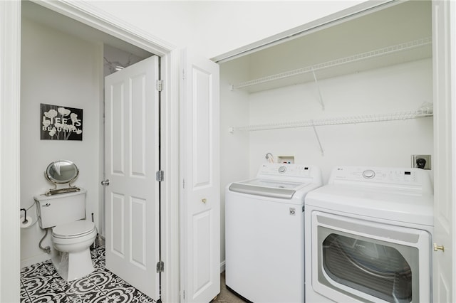 1000 Providence Pl Unit 467, Providence, RI 02903 - laundry area with separate washer and dryer and tile patterned flooring