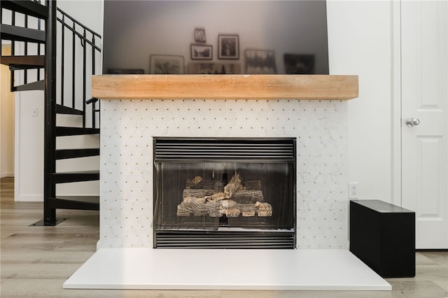 1000 Providence Pl Unit 467, Providence, RI 02903 - detailed view of a fireplace and wood finished floors
