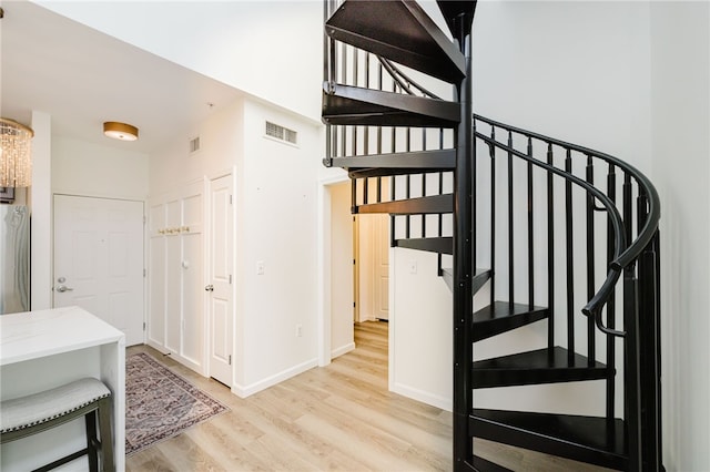 1000 Providence Pl Unit 467, Providence, RI 02903 - stairs featuring wood finished floors and baseboards