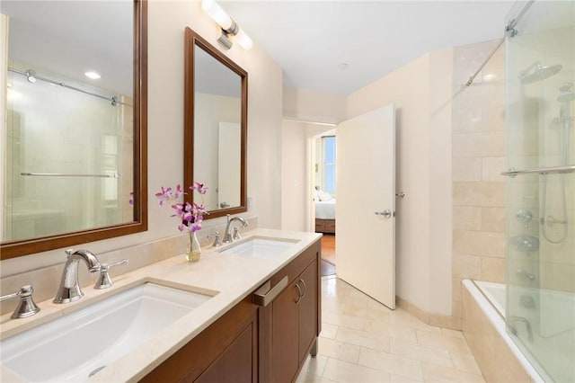 1 W Exchange St Unit 2802, Providence, RI 02903 - bathroom featuring double vanity, tiled shower / bath combo, ensuite bath, and tile patterned floors
