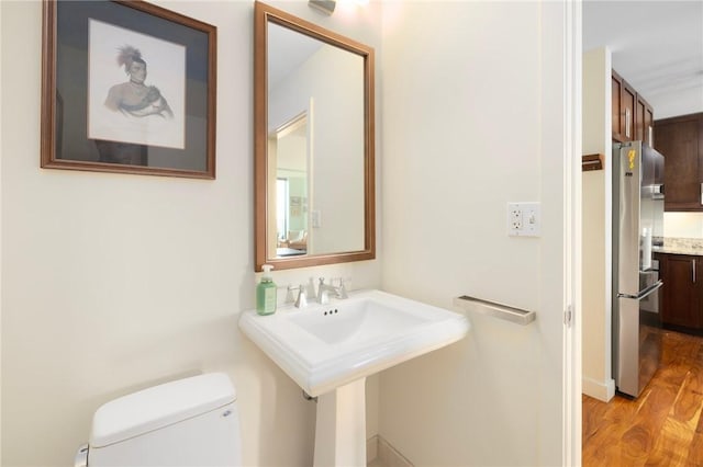 1 W Exchange St Unit 2802, Providence, RI 02903 - half bathroom with toilet and wood finished floors