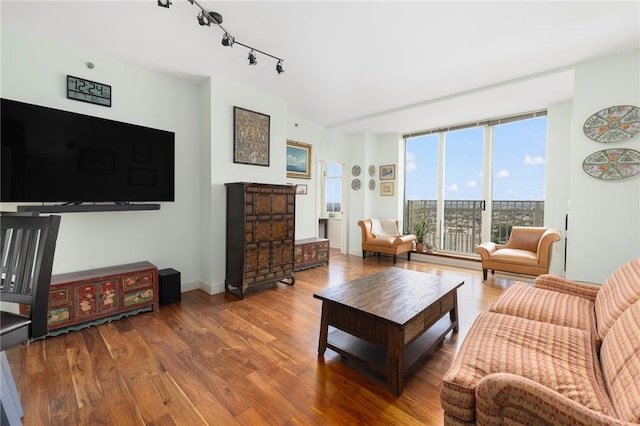 1 W Exchange St Unit 2802, Providence, RI 02903 - living area featuring track lighting, expansive windows, and wood finished floors