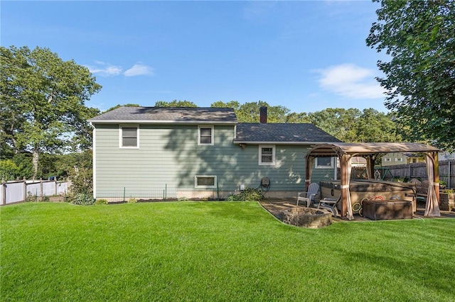 62 Pembroke Ln, Coventry, RI 02816 - rear view of house with a gazebo, a hot tub, and a chimney