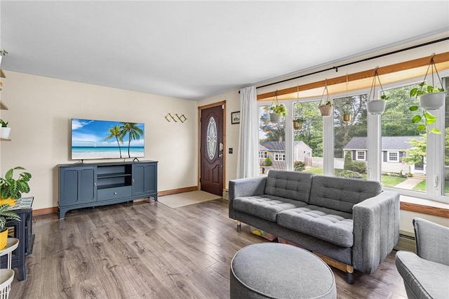 62 Pembroke Ln, Coventry, RI 02816 - living room with wood finished floors and baseboards