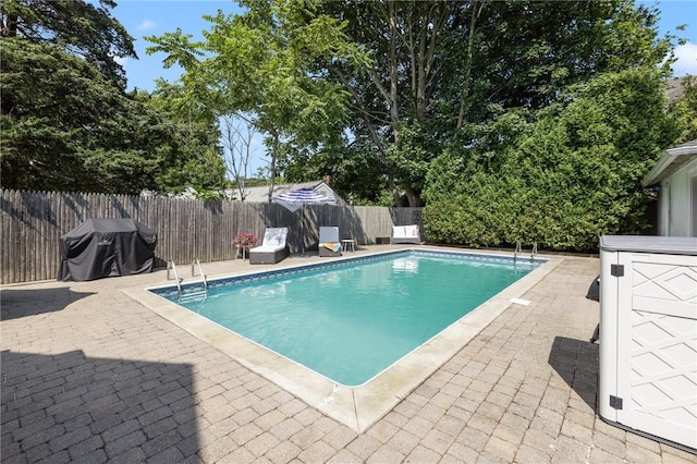 7 Pleasant Vw, Jamestown, RI 02835 - view of pool with grilling area, a patio area, and a fenced backyard