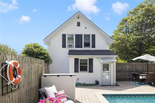 7 Pleasant Vw, Jamestown, RI 02835 - rear view of house with a patio, roof with shingles, and cooling unit
