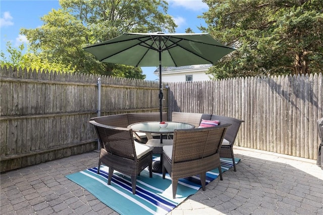 7 Pleasant Vw, Jamestown, RI 02835 - fenced backyard with a patio and outdoor dining area