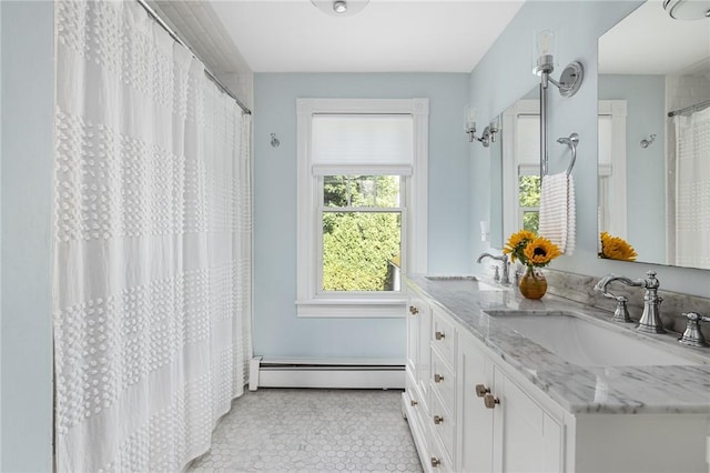 7 Pleasant Vw, Jamestown, RI 02835 - bathroom with a baseboard heating unit, double vanity, a shower with shower curtain, and tile patterned flooring