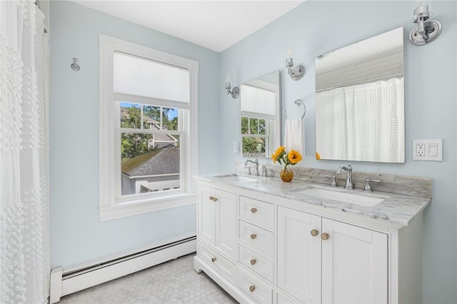 7 Pleasant Vw, Jamestown, RI 02835 - bathroom with baseboard heating and double vanity