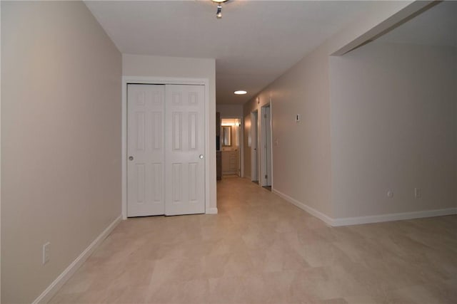 132 Hoffman Ave Unit 202, Cranston, RI 02920 - corridor featuring baseboards and light carpet