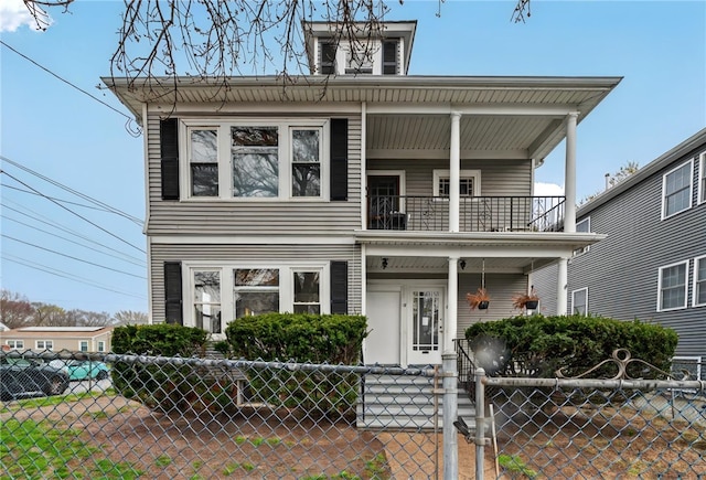 15 Melissa St, Providence, RI 02909 - view of front of home with a balcony and a fenced front yard