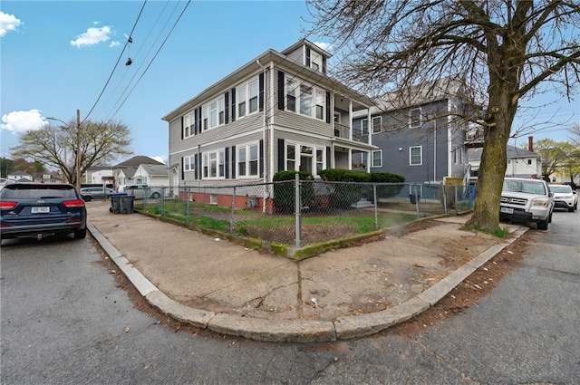 15 Melissa St, Providence, RI 02909 - view of front of property with a fenced front yard