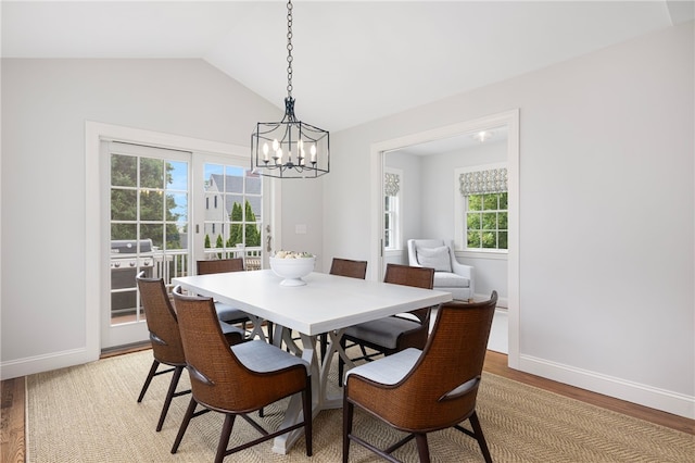 10 Linden Gate Ln, Newport, RI 02840 - dining space featuring light wood finished floors, a chandelier, and lofted ceiling