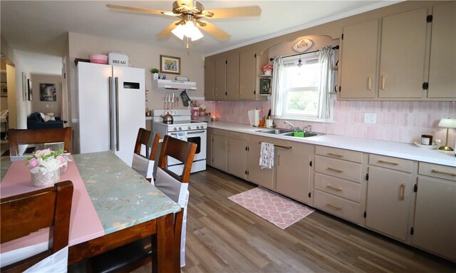 10 Park Way, Lincoln, RI 02838 - kitchen featuring white appliances, under cabinet range hood, decorative backsplash, wood finished floors, and a ceiling fan