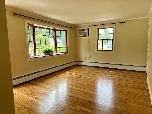 55 Circle Dr, Mansfield, CT 06250 - empty room with a wall mounted AC, ornamental molding, a baseboard heating unit, and wood finished floors