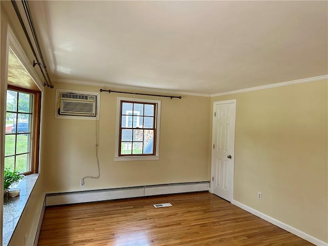 55 Circle Dr, Mansfield, CT 06250 - unfurnished room with a baseboard radiator, wood finished floors, healthy amount of natural light, a wall mounted AC, and ornamental molding