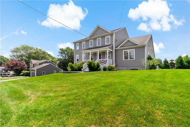 54 Michael Dr, Bristol, RI 02809 - colonial inspired home with covered porch, a front lawn, and a garage