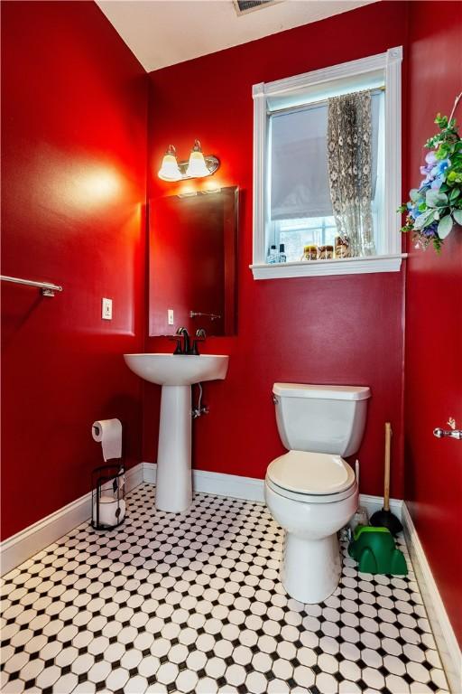 50 S Pond Dr, Coventry, RI 02816 - half bath with toilet and baseboards