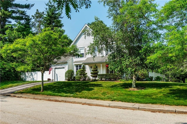 50 S Pond Dr, Coventry, RI 02816 - view of property hidden behind natural elements featuring asphalt driveway and an attached garage