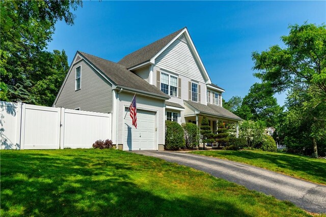 50 S Pond Dr, Coventry, RI 02816 - view of front of house featuring driveway and a garage
