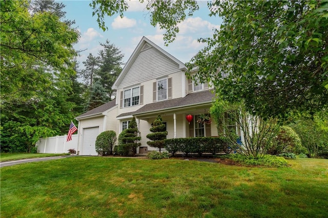 50 S Pond Dr, Coventry, RI 02816 - view of front of house featuring a garage, a porch, and asphalt driveway